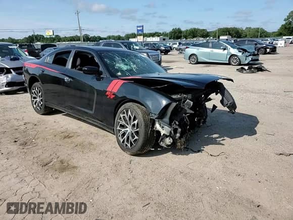 2013 Dodge Charger SE с VIN 2C3CDXBG0DH554990, выставлен на аукционе Copart как лот 67819975 с пробегом 164 226 миль миль и Списание • Salvage title. История ставок и продаж доступна на DreamBid. Изображение 13.