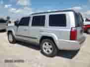 2007 Jeep Commander Sport z VIN 1J8HG48K87C653673, wystawiony jako Copart lot #50771524 z przebiegiem 213 411 mil mil oraz Szkoda całkowita • Salvage title. Historia ofert i sprzedaży dostępna na DreamBid. Obrazek 2.