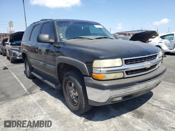 2002 Chevrolet Tahoe LS z VIN 1GNEC13V42R208947, wystawiony jako Copart lot #80217455 z przebiegiem 302 468 mil mil oraz Szkoda całkowita • Salvage title. Historia ofert i sprzedaży dostępna na DreamBid. Obrazek 4.