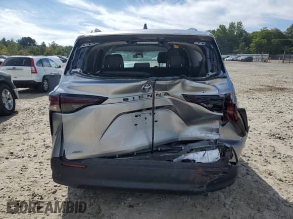 2023 Toyota Sienna LE with VIN 5TDKSKFC6PS092223, listed as a Copart auction lot 80493715 with 27,214 mi miles and Salvage title. Bid and sale history available at DreamBid. Image 6.