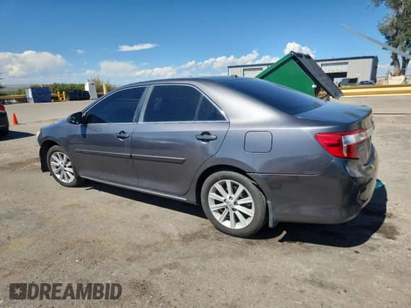 2014 Toyota Camry XLE with VIN 4T4BF1FK3ER345708, listed as a Copart auction lot 71482385 with 141,276 mi miles and Salvage title. Bid and sale history available at DreamBid. Image 2.
