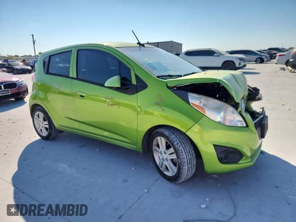 2014 Chevrolet Spark LS with VIN KL8CB6S94EC565436, listed as a Copart auction lot 86057295 with 106,927 mi miles and Salvage title. Bid and sale history available at DreamBid. Image 4.