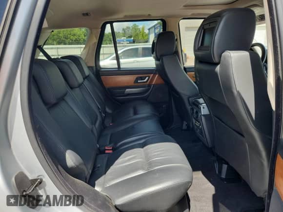 2007 Land Rover Range Rover Sport SC с VIN SALSH23427A989797, выставлен на аукционе Copart как лот 60276985 с пробегом 111 763 миль миль и Списание • Salvage title. История ставок и продаж доступна на DreamBid. Изображение 11.