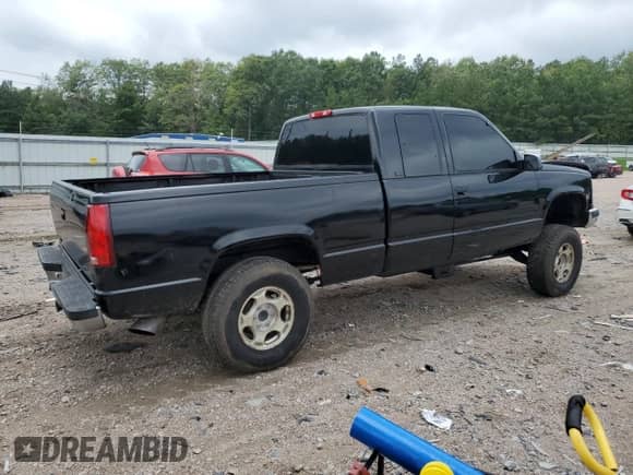1997 GMC Sierra 1500 with VIN 1GTEK19R4VE502673, listed as a Copart auction lot 63619335 with 225,758 mi miles and Salvage title. Bid and sale history available at DreamBid. Image 3.