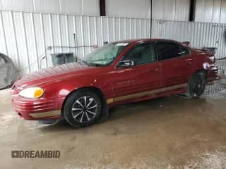 2001 Pontiac Grand Am SE z VIN 1G2NE52T11M538765, wystawiony jako Copart lot #67517905 z przebiegiem 98 096 mil mil oraz Szkoda całkowita • Salvage title. Historia ofert i sprzedaży dostępna na DreamBid. Obrazek 1.