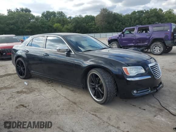 2012 Chrysler 300 with VIN 2C3CCAAGXCH176113, listed as a Copart auction lot 81804825 with 122,140 mi miles and Salvage title. Bid and sale history available at DreamBid. Image 4.