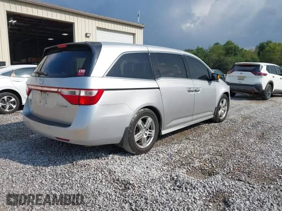2012 Honda Odyssey Touring с VIN 5FNRL5H90CB004277, выставлен на аукционе IAAI как лот 43251419 с пробегом 122 081 миль миль и . История ставок и продаж доступна на DreamBid. Изображение 4.