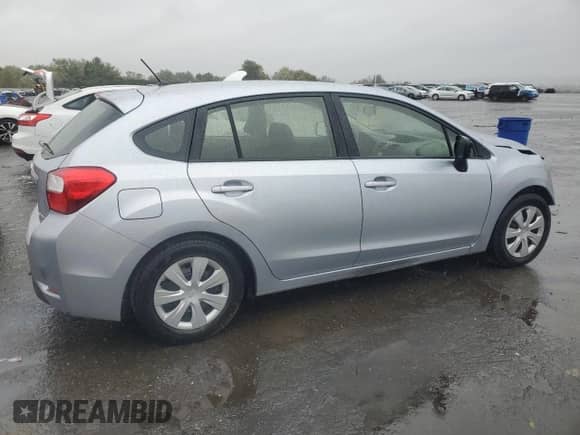 2014 Subaru Impreza 2.0i with VIN JF1GPAA65EH335062, listed as a Copart auction lot 82424325 with 56,739 mi miles and Salvage title. Bid and sale history available at DreamBid. Image 3.