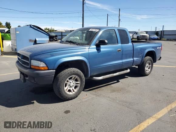 2003 Dodge Dakota с VIN 1D7HG12X03S248228, выставлен на аукционе Copart как лот 80327945 с пробегом 110 038 миль миль и Списание • Salvage title. История ставок и продаж доступна на DreamBid. Изображение 1.