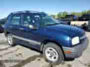 2002 Chevrolet Tracker with VIN 2CNBE13C926933455, listed as a Copart auction lot 58235764 with 189,629 mi miles and Salvage title. Bid and sale history available at DreamBid. Image 4.