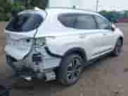 2020 Hyundai Santa Fe SEL with VIN 5NMS3CAA9LH167924, listed as a IAAI auction lot 42394309 with 66,160 mi miles and . Bid and sale history available at DreamBid. Image 4.