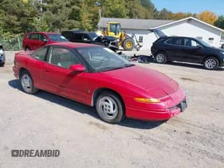 1993 Saturn SC with VIN 1G8ZH1575PZ277058, listed as a IAAI auction lot 43217582 with 148,273 mi miles and . Bid and sale history available at DreamBid. Image 1.