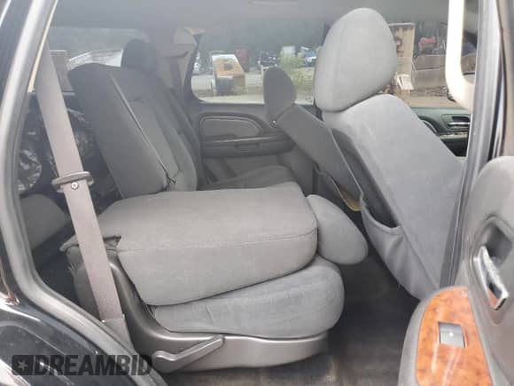 2009 Chevrolet Tahoe LS z VIN 1GNFC13C69R137473, wystawiony jako Copart lot #64177375 z przebiegiem 285 004 mil mil oraz Szkoda całkowita • Salvage title. Historia ofert i sprzedaży dostępna na DreamBid. Obrazek 10.