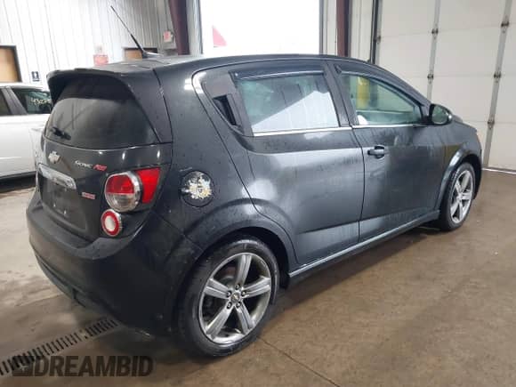2014 Chevrolet Sonic RS with VIN 1G1JG6SB5E4210541, listed as a IAAI auction lot 43242084 with 146,454 mi miles and . Bid and sale history available at DreamBid. Image 4.
