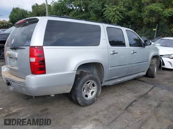 2013 Chevrolet Suburban LTZ с VIN 1GNSKKE74DR233795, выставлен на аукционе IAAI как лот 42971785 с пробегом 190 946 миль миль и . История ставок и продаж доступна на DreamBid. Изображение 4.