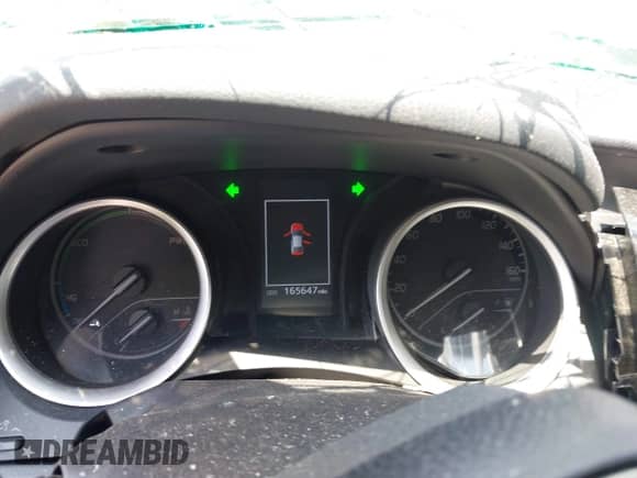 2022 Toyota Camry Hybrid LE with VIN 4T1C31AK2NU575304, listed as a IAAI auction lot 43017963 with 165,647 mi miles and . Bid and sale history available at DreamBid. Image 7.