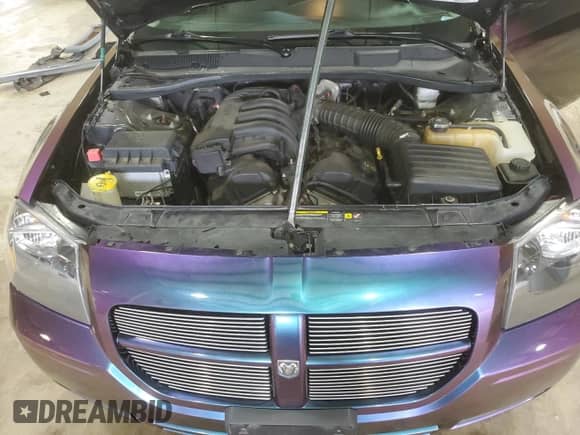 2005 Dodge Magnum SE with VIN 2D4FV48T25H161344, listed as a Copart auction lot 68303715 with 95,064 mi miles and Salvage title. Bid and sale history available at DreamBid. Image 11.