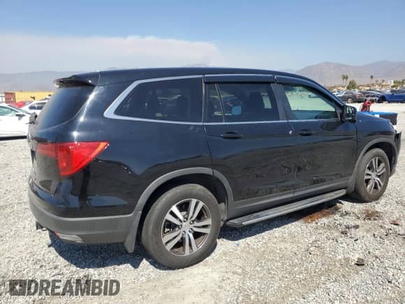 2017 Honda Pilot EX-L with VIN 5FNYF5H68HB047149, listed as a Copart auction lot 73591384 with 112,458 mi miles and Salvage title. Bid and sale history available at DreamBid. Image 3.