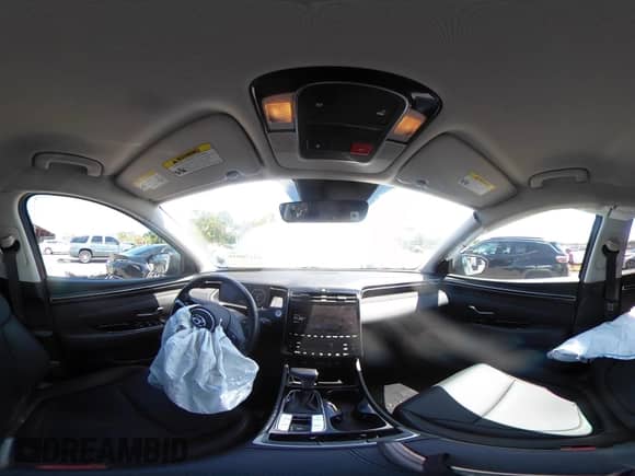 2023 Hyundai Tucson XRT with VIN KM8JFCAEXPU261133, listed as a IAAI auction lot 42270010 with 34,709 mi miles and . Bid and sale history available at DreamBid. Image 18.