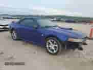 2004 Ford Mustang Deluxe с VIN 1FAFP444X4F107575, выставлен на аукционе Copart как лот 60908705 с пробегом 148 467 миль миль и Списание • Salvage title. История ставок и продаж доступна на DreamBid. Изображение 4.