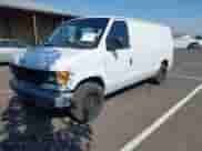 2000 Ford Econoline Cargo with VIN 1FTRE1421YHA04873, listed as a IAAI auction lot 43104196 with 193,720 mi miles and . Bid and sale history available at DreamBid. Image 2.