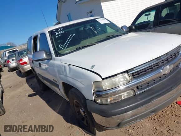 2003 Chevrolet Tahoe LS z VIN 1GNEC13Z63R140932, wystawiony jako IAAI lot #41703060 z przebiegiem 345 133 mil mil oraz . Historia ofert i sprzedaży dostępna na DreamBid. Obrazek 1.