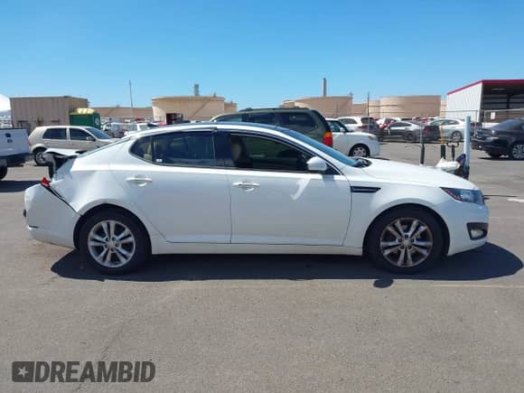 2013 KIA OPTIMA with VIN SXXGN4A75DG170636, listed as a IAAI auction lot 43096697 with 83,396 mi miles and . Bid and sale history available at DreamBid. Image 13.
