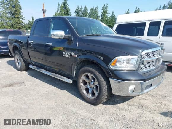 2016 Ram 1500 Laramie z VIN 1C6RR7VT4GS323532, wystawiony jako IAAI lot #42570478 z przebiegiem 142 136 mil mil oraz . Historia ofert i sprzedaży dostępna na DreamBid. Obrazek 1.