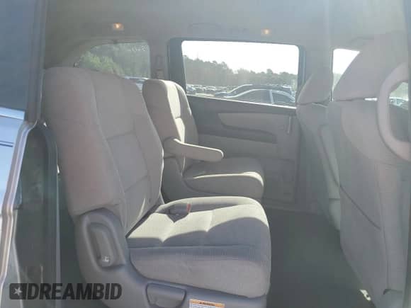 2012 Honda Odyssey LX with VIN 5FNRL5H27CB081019, listed as a Copart auction lot 84878565 with 110,802 mi miles and Salvage title. Bid and sale history available at DreamBid. Image 11.