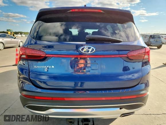 2023 Hyundai Santa Fe SEL with VIN 5NMS34AJ7PH551485, listed as a Copart auction lot 90524895 with 34,059 mi miles and Salvage title. Bid and sale history available at DreamBid. Image 6.