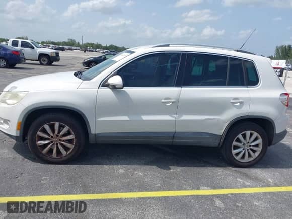 2011 Volkswagen Tiguan S with VIN WVGAV7AX9BW514225, listed as a IAAI auction lot 42461785 with 128,973 mi miles and . Bid and sale history available at DreamBid. Image 6.