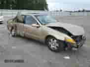 2001 Saturn LS with VIN 1G8JW54R11Y557232, listed as a Copart auction lot 74638904 with 158,729 mi miles and Salvage title. Bid and sale history available at DreamBid. Image 4.