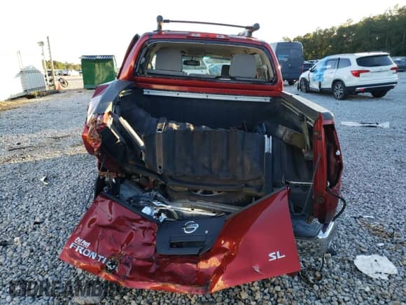 2012 Nissan Frontier SL с VIN 1N6AD0ER1CC474166, выставлен на аукционе Copart как лот 87020904 с пробегом 43 101 миль миль и Списание • Salvage title. История ставок и продаж доступна на DreamBid. Изображение 6.