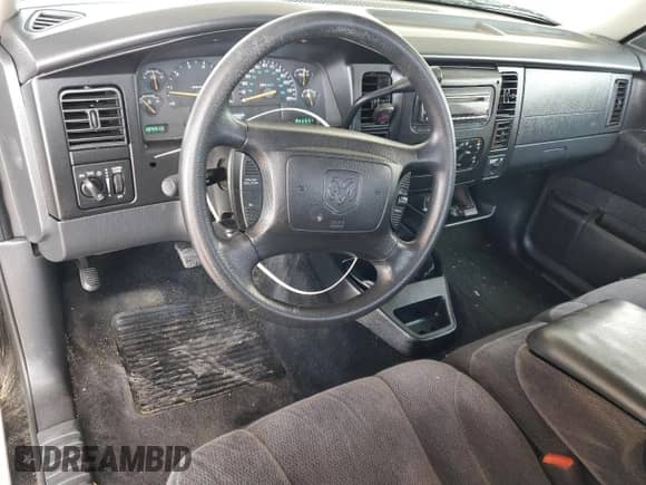 2001 Dodge Dakota с VIN 1B7GL22X61S307352, выставлен на аукционе Copart как лот 70953535 с пробегом 124 413 миль миль и Списание • Salvage title. История ставок и продаж доступна на DreamBid. Изображение 8.