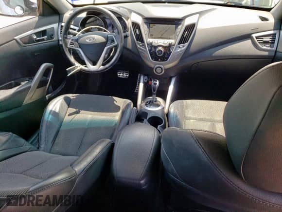 2013 Hyundai Veloster w/Black Int z VIN KMHTC6AD9DU147646, wystawiony jako Copart lot #58495585 z przebiegiem 121 781 mil mil oraz Szkoda całkowita • Salvage title. Historia ofert i sprzedaży dostępna na DreamBid. Obrazek 8.