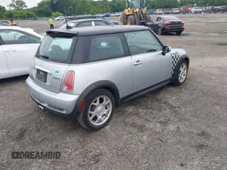 2006 MINI Hardtop S with VIN WMWRE33556TJ37120, listed as a IAAI auction lot 42601923 with 51,501 mi miles and . Bid and sale history available at DreamBid. Image 4.