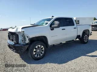 2021 Chevrolet Silverado 2500HD Custom z VIN 1GC4YME74MF288597, wystawiony jako Copart lot #65971905 z przebiegiem 58 694 mil mil oraz Szkoda całkowita • Salvage title. Historia ofert i sprzedaży dostępna na DreamBid. Obrazek 1.