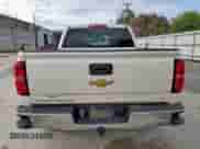 2015 Chevrolet Silverado 1500 LT z VIN 3GCPCREC6FG401277, wystawiony jako Copart lot #83988375 z przebiegiem Nie podano mil oraz Szkoda całkowita • Salvage title. Historia ofert i sprzedaży dostępna na DreamBid. Obrazek 6.