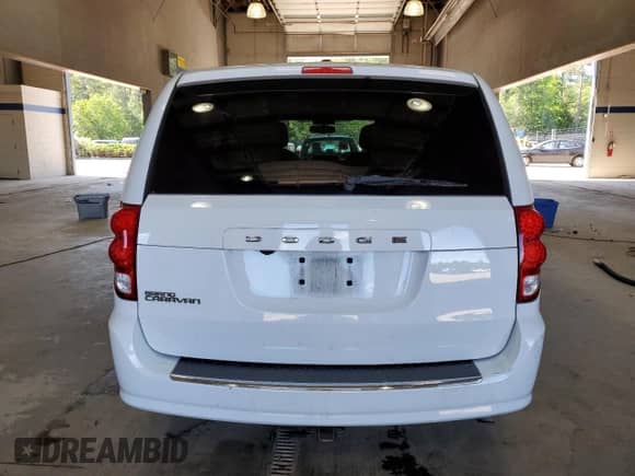 2016 Dodge Grand Caravan American Value z VIN 2C4RDGBG7GR184478, wystawiony jako Copart lot #58012835 z przebiegiem 166 296 mil mil oraz Szkoda całkowita • Salvage title. Historia ofert i sprzedaży dostępna na DreamBid. Obrazek 6.