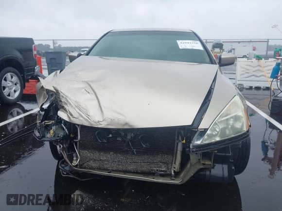 2003 Honda Accord LX with VIN 1HGCM66313A037385, listed as a IAAI auction lot 42942358 with 385,096 mi miles and . Bid and sale history available at DreamBid. Image 12.