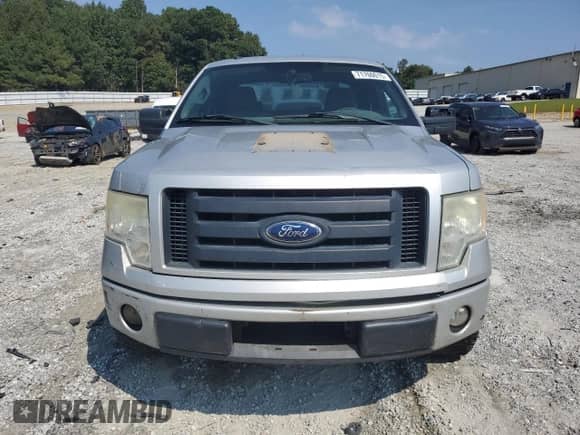 2009 Ford F-150 STX with VIN 1FTRX12W69KB73890, listed as a Copart auction lot 71760015 with 525,469 mi miles and Salvage title. Bid and sale history available at DreamBid. Image 5.