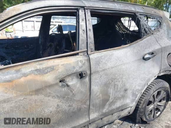 2014 Hyundai Santa Fe с VIN 5XYZUDLBXEG185949, выставлен на аукционе IAAI как лот 43249188 с пробегом Не указан миль и . История ставок и продаж доступна на DreamBid. Изображение 6.