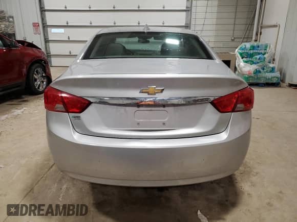 2019 Chevrolet Impala LS с VIN 2G11X5SAXK9141677, выставлен на аукционе Copart как лот 86706424 с пробегом 69 548 миль миль и Списание • Salvage title. История ставок и продаж доступна на DreamBid. Изображение 6.