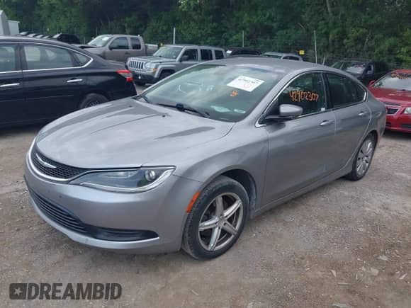 2015 Chrysler 200 LX with VIN 1C3CCCFB2FN733942, listed as a IAAI auction lot 42902307 with 197,311 mi miles and . Bid and sale history available at DreamBid. Image 2.