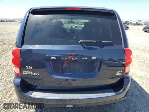 2014 Dodge Grand Caravan SXT z VIN 2C4RDGCGXER245348, wystawiony jako Copart lot #71056055 z przebiegiem 145 286 mil mil oraz Szkoda całkowita • Salvage title. Historia ofert i sprzedaży dostępna na DreamBid. Obrazek 6.