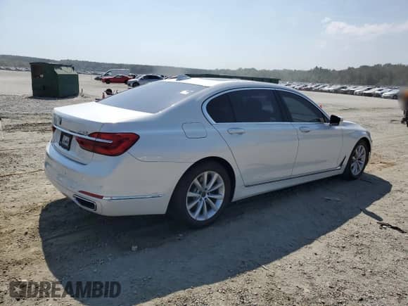 2017 BMW 7 Series 740i with VIN WBA7E2C5XHG739931, listed as a Copart auction lot 81453395 with 121,438 mi miles and Clean title. Bid and sale history available at DreamBid. Image 3.