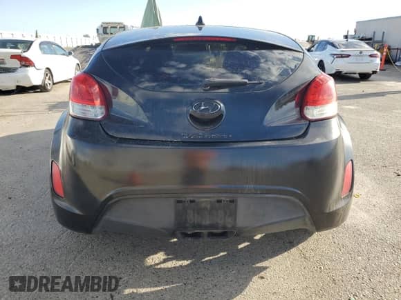 2013 Hyundai Veloster w/Black Int z VIN KMHTC6AD8DU147119, wystawiony jako Copart lot #82261415 z przebiegiem 132 516 mil mil oraz Szkoda całkowita • Salvage title. Historia ofert i sprzedaży dostępna na DreamBid. Obrazek 6.