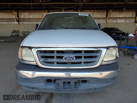 2000 Ford F-150 XL z VIN 1FTRX17W0YKA76241, wystawiony jako Copart lot #68135235 z przebiegiem Nie podano mil oraz Szkoda całkowita • Salvage title. Historia ofert i sprzedaży dostępna na DreamBid. Obrazek 5.