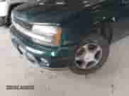 2006 Chevrolet TrailBlazer LS z VIN 1GNET16SX66110417, wystawiony jako IAAI lot #42823502 z przebiegiem 131 013 mil mil oraz . Historia ofert i sprzedaży dostępna na DreamBid. Obrazek 6.