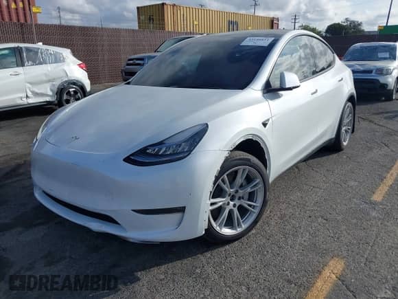 2023 Tesla Model Y Long Range with VIN 7SAYGDEE0PA135579, listed as a IAAI auction lot 43196811 with 44,886 mi miles and . Bid and sale history available at DreamBid. Image 19.